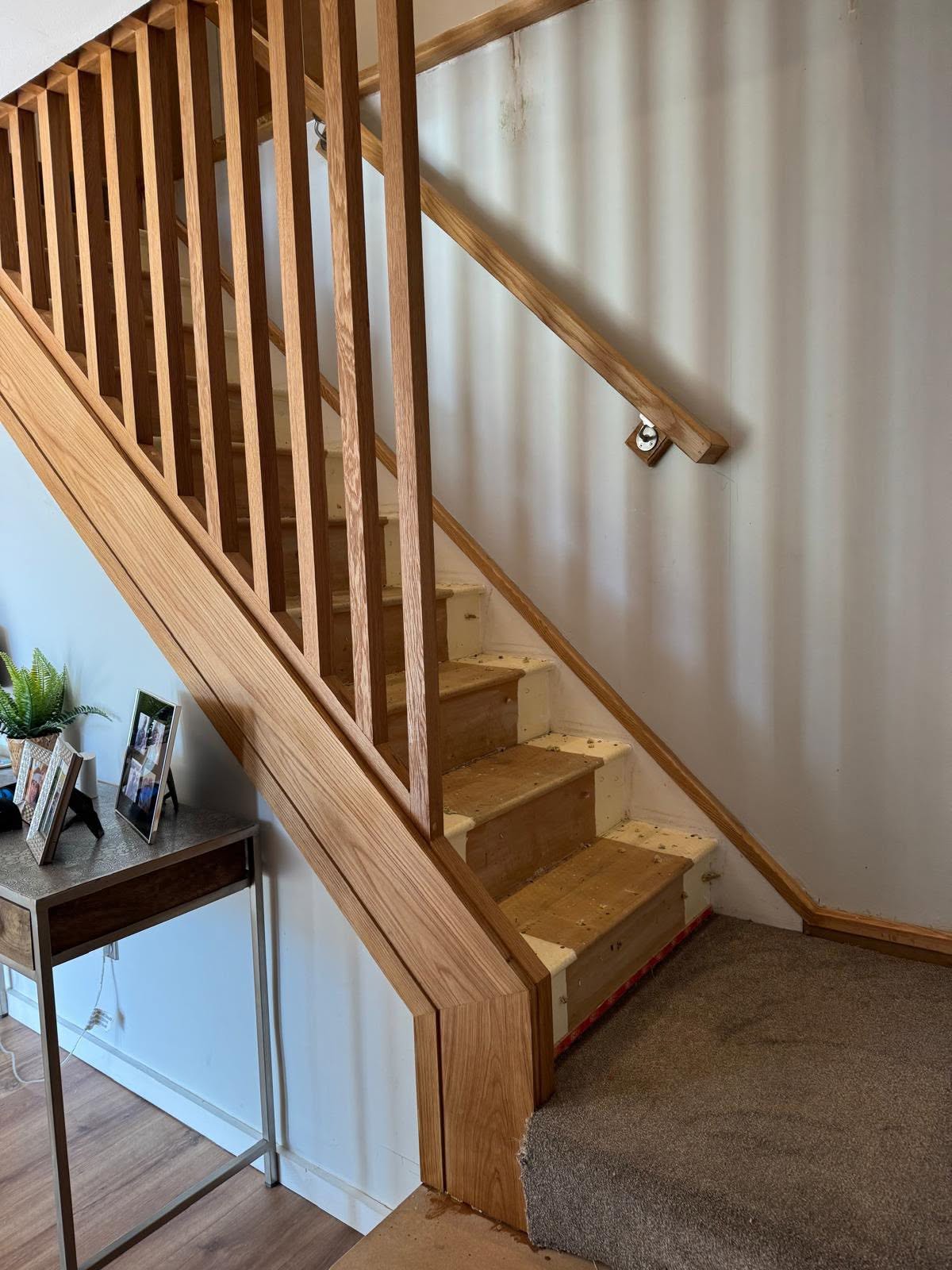 Modern interior staircase with timer poles