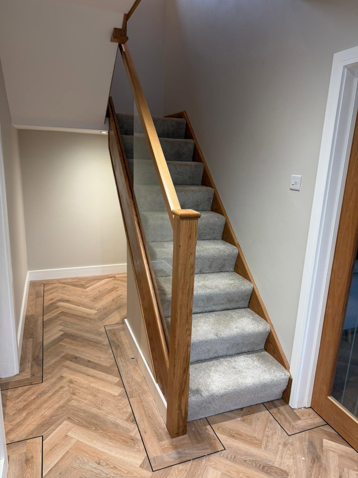 Bespoke staircase with glass and timber balustrades