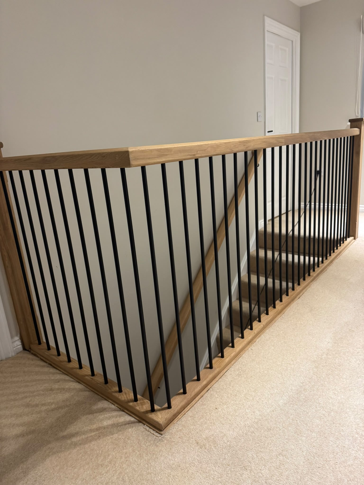Modern staircase design combining timber and metal finishes